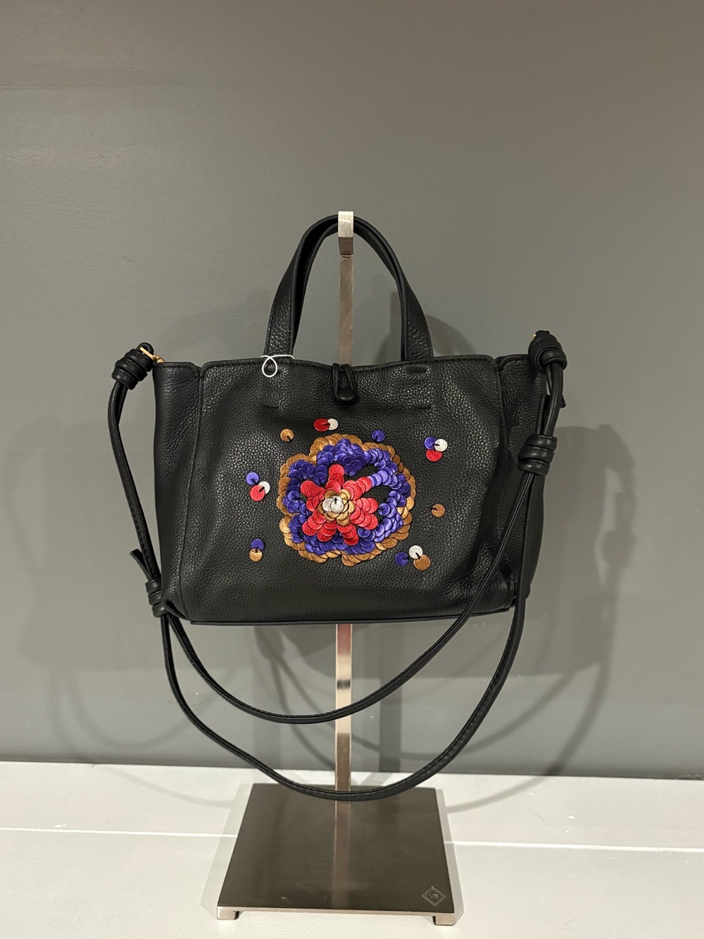Black Leather Handbag with Floral Embellishment